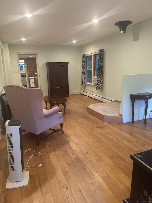 25 Goose Green Rd, Barkhamsted, CT 06063 - living room featuring a baseboard heating unit, hardwood / wood-style flooring, and recessed lighting