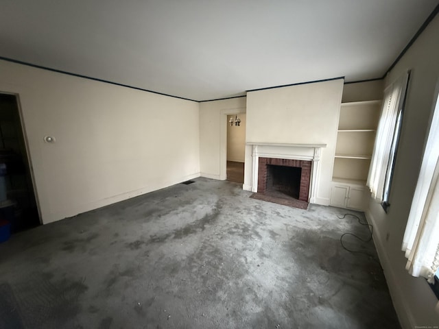 27 Longview Ave, Fairfield, CT 06824 - unfurnished living room with a brick fireplace and carpet