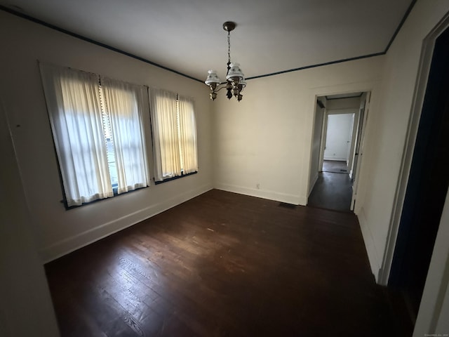 27 Longview Ave, Fairfield, CT 06824 - empty room featuring a chandelier and dark wood finished floors