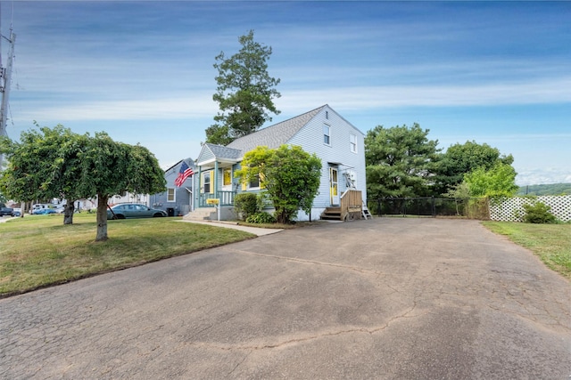 102 Vista Dr, East Haven, CT 06512 - view of front facade featuring driveway and a shingled roof