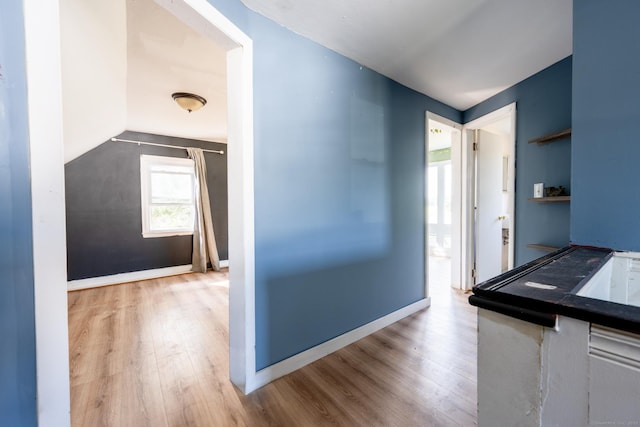 102 Vista Dr, East Haven, CT 06512 - hall with wood finished floors and vaulted ceiling