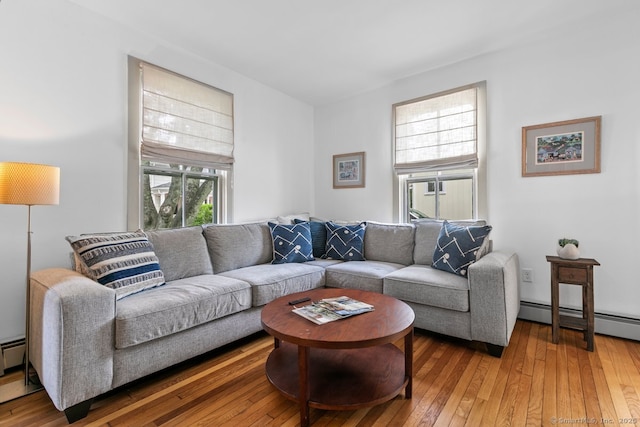 2 Ashby St, Groton, CT 06355 - living room featuring baseboard heating and light wood-style floors