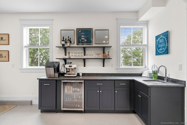 2 Ashby St, Groton, CT 06355 - indoor dry bar featuring wine cooler and plenty of natural light
