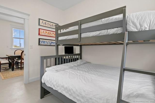 2 Ashby St, Groton, CT 06355 - bedroom featuring finished concrete flooring and baseboards