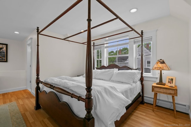 2 Ashby St, Groton, CT 06355 - bedroom featuring baseboard heating, wood finished floors, and recessed lighting