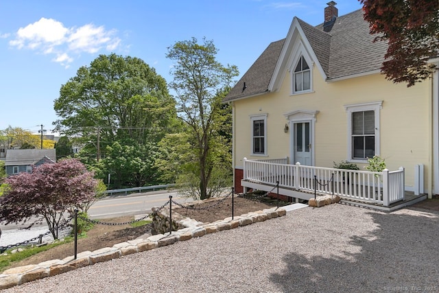 2 Ashby St, Groton, CT 06355 - view of property exterior featuring roof with shingles and a chimney