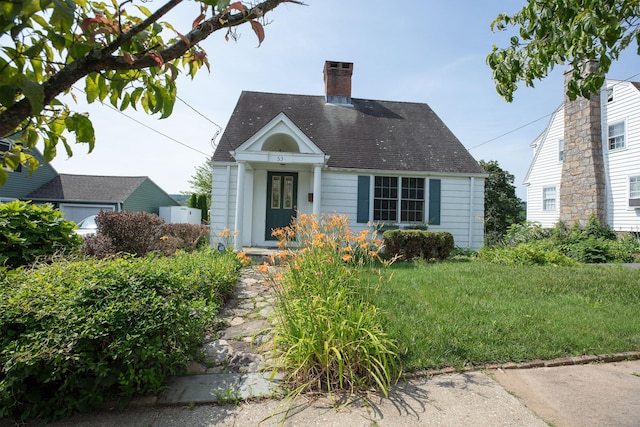 53 Haviland St, Bristol, CT 06010 - new england style home with a chimney and a shingled roof