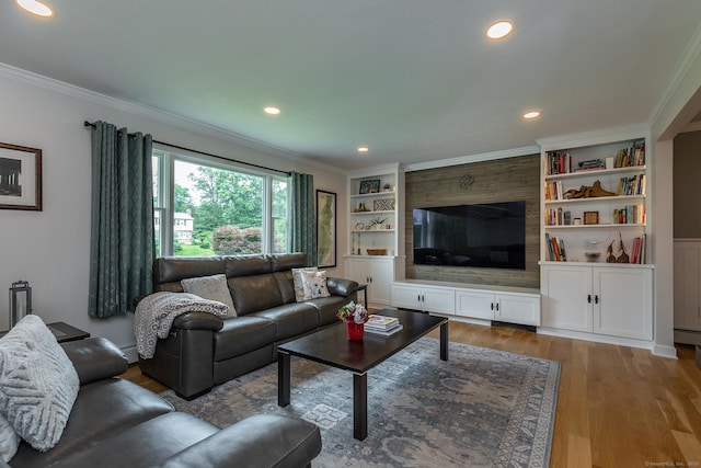 28 Musket Ridge Rd, New Fairfield, CT 06812 - living room with ornamental molding, light wood finished floors, recessed lighting, and built in shelves