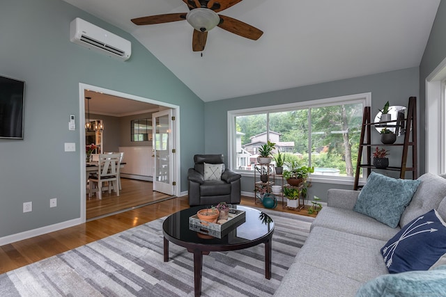 28 Musket Ridge Rd, New Fairfield, CT 06812 - living area with a wall mounted air conditioner, vaulted ceiling, ceiling fan, wood finished floors, and a chandelier