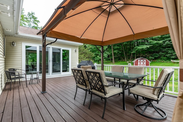 28 Musket Ridge Rd, New Fairfield, CT 06812 - deck featuring outdoor dining space, a storage shed, and a gazebo