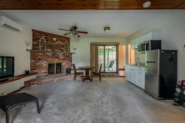 28 Musket Ridge Rd, New Fairfield, CT 06812 - carpeted living area featuring a wall mounted air conditioner, a brick fireplace, and a ceiling fan