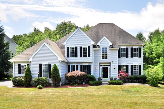 32 Arlington Dr, Avon, CT 06001 - view of front of home featuring a front lawn and roof with shingles