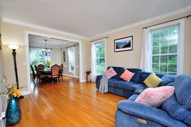 32 Arlington Dr, Avon, CT 06001 - living room with a chandelier, light wood-style flooring, and ornamental molding
