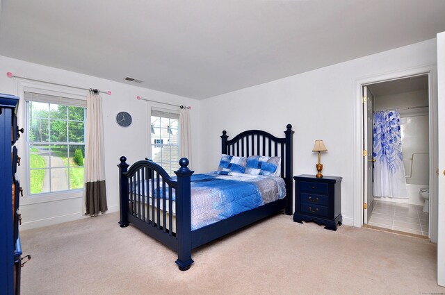32 Arlington Dr, Avon, CT 06001 - carpeted bedroom featuring multiple windows and ensuite bathroom