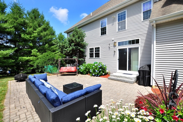 32 Arlington Dr, Avon, CT 06001 - view of patio / terrace with entry steps and an outdoor living space with a fire pit