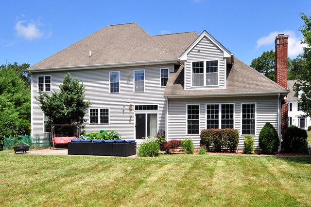32 Arlington Dr, Avon, CT 06001 - back of property with an outdoor living space with a fire pit, a yard, a chimney, and a shingled roof