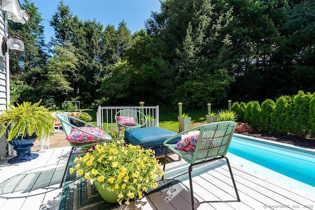 6 Trolley Xing, Old Saybrook, CT 06475 - swimming pool featuring a deck and view of scattered trees