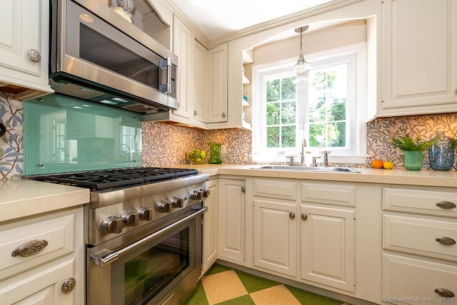 6 Trolley Xing, Old Saybrook, CT 06475 - kitchen featuring stainless steel appliances, light countertops, and tasteful backsplash