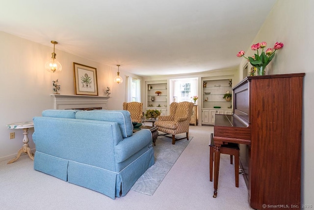 6 Trolley Xing, Old Saybrook, CT 06475 - carpeted living area with built in features and a fireplace