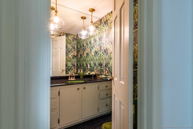 6 Trolley Xing, Old Saybrook, CT 06475 - bathroom featuring vanity, tile patterned flooring, a chandelier, and wallpapered walls