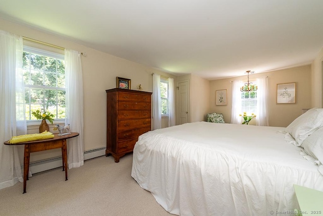6 Trolley Xing, Old Saybrook, CT 06475 - bedroom with baseboard heating, multiple windows, and light colored carpet