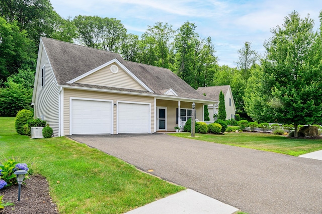 199 Meadow Brook Rd Unit 199, Oxford, CT 06478 - single story home with a garage, asphalt driveway, a front lawn, and roof with shingles