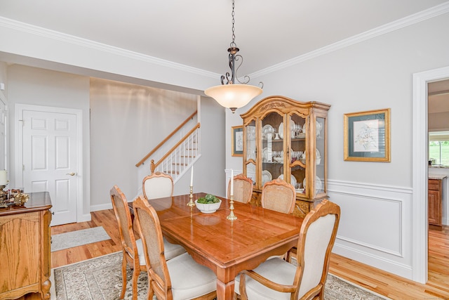 199 Meadow Brook Rd Unit 199, Oxford, CT 06478 - dining room with light wood finished floors, stairs, and ornamental molding