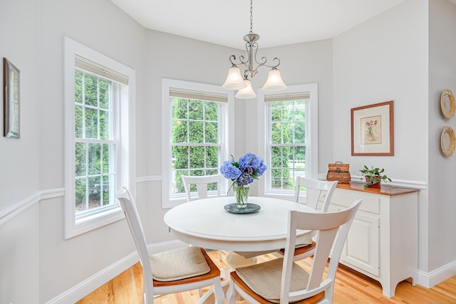 199 Meadow Brook Rd Unit 199, Oxford, CT 06478 - dining room featuring a chandelier, healthy amount of natural light, and light wood-style floors