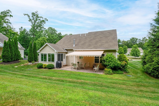 199 Meadow Brook Rd Unit 199, Oxford, CT 06478 - back of property featuring a patio area, a yard, and a shingled roof