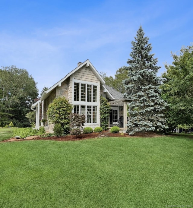 32 Meeks Point Rd, East Hampton, CT 06424 - back of property featuring a yard