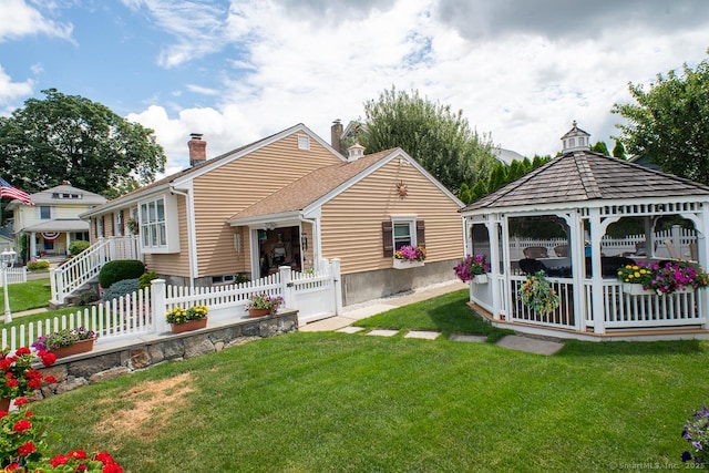 2 Oak Ter, Stratford, CT 06614 - rear view of property with a gazebo and a chimney