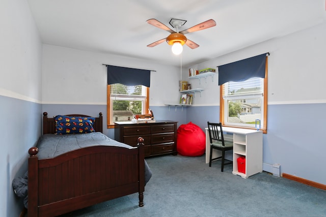 630 Fairview Ave, Bridgeport, CT 06606 - bedroom featuring multiple windows, carpet floors, a baseboard heating unit, and ceiling fan