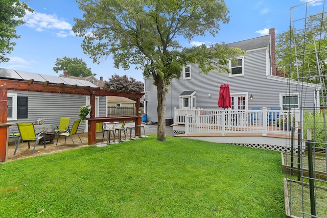 630 Fairview Ave, Bridgeport, CT 06606 - view of grassy yard with a fire pit, a deck, a pergola, and a patio
