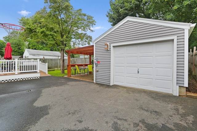 630 Fairview Ave, Bridgeport, CT 06606 - detached garage featuring asphalt driveway