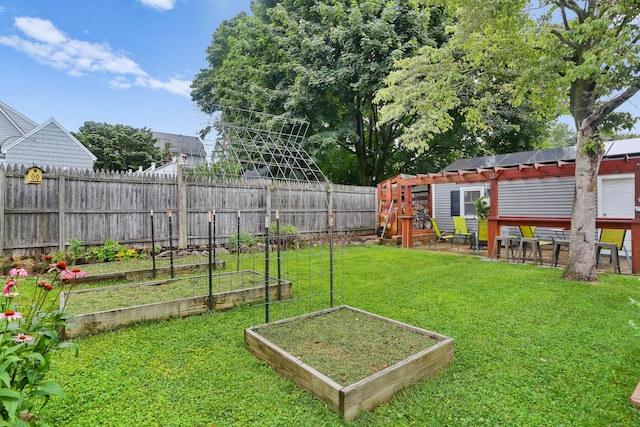 630 Fairview Ave, Bridgeport, CT 06606 - fenced backyard featuring a garden