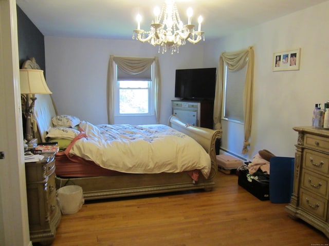 21 Kingswood Rd, Danbury, CT 06811 - bedroom with a chandelier and wood finished floors