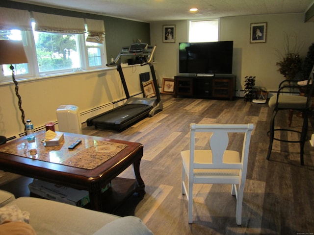 21 Kingswood Rd, Danbury, CT 06811 - living area with healthy amount of natural light, wood finished floors, a baseboard heating unit, and recessed lighting