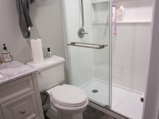 21 Kingswood Rd, Danbury, CT 06811 - bathroom with a stall shower, vanity, and wood finished floors
