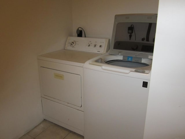 21 Kingswood Rd, Danbury, CT 06811 - laundry room with separate washer and dryer and light tile patterned flooring