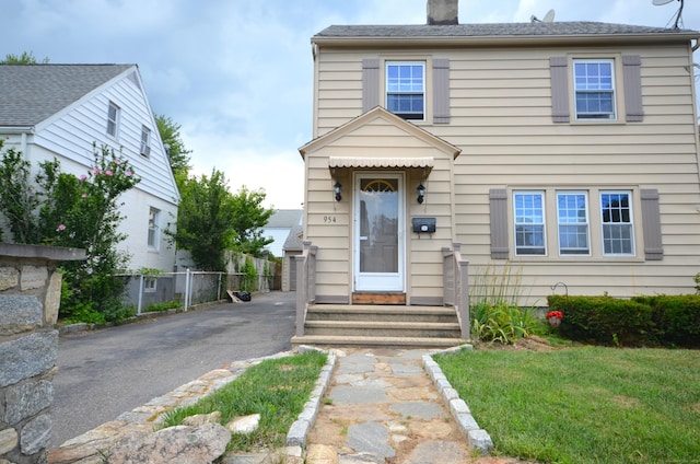 954 Birmingham St, Bridgeport, CT 06606 - view of front of home with a chimney
