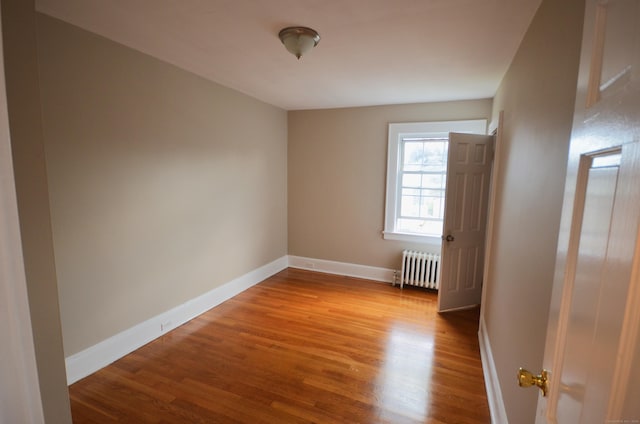 954 Birmingham St, Bridgeport, CT 06606 - spare room featuring radiator and wood finished floors