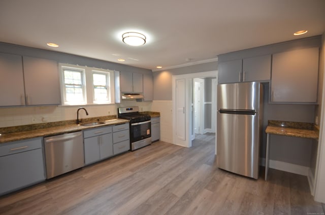 954 Birmingham St, Bridgeport, CT 06606 - kitchen featuring stainless steel appliances, gray cabinets, under cabinet range hood, light wood-style floors, and recessed lighting