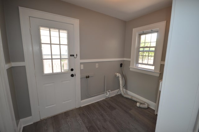 954 Birmingham St, Bridgeport, CT 06606 - doorway with baseboards and dark wood-style flooring