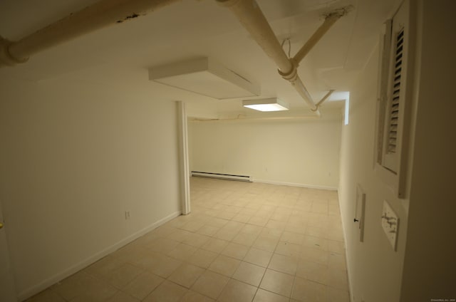954 Birmingham St, Bridgeport, CT 06606 - finished below grade area with a baseboard radiator and baseboards