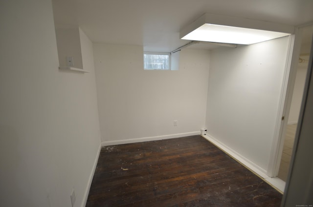 954 Birmingham St, Bridgeport, CT 06606 - below grade area featuring hardwood / wood-style floors and baseboards