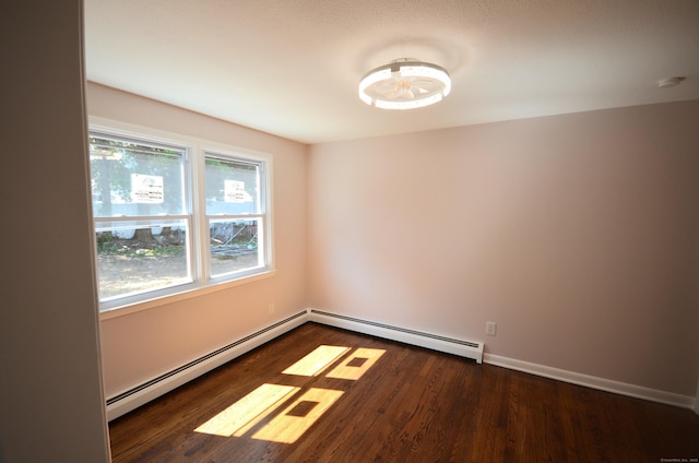 335 Wiklund Ave, Stratford, CT 06614 - empty room with a baseboard radiator, wood finished floors, and a smoke detector