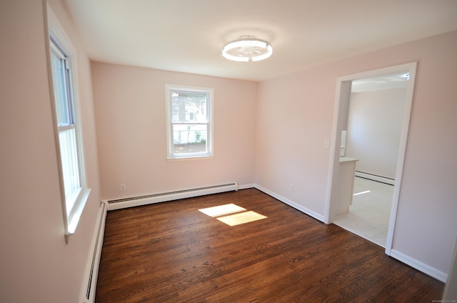 335 Wiklund Ave, Stratford, CT 06614 - unfurnished room with baseboard heating and wood finished floors