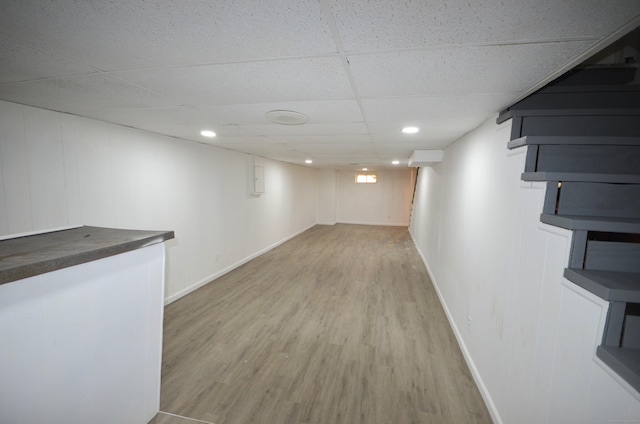 335 Wiklund Ave, Stratford, CT 06614 - finished basement featuring light wood finished floors and a drop ceiling