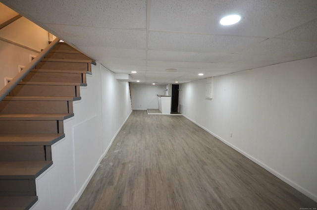 335 Wiklund Ave, Stratford, CT 06614 - finished basement featuring stairway, wood finished floors, a drop ceiling, and recessed lighting