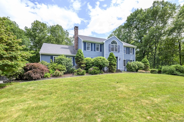 491 Hammertown Rd, Monroe, CT 06468 - colonial home featuring a chimney and a front lawn